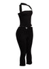 Chic halter neck top paired with figure-hugging capri pants, ideal for a bold and sophisticated outfit.