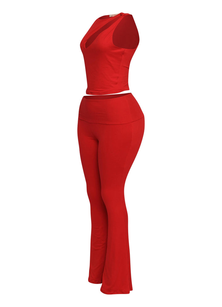 Vibrant red Y2K-inspired two-piece with sleek lines and cut-out crop top detail

