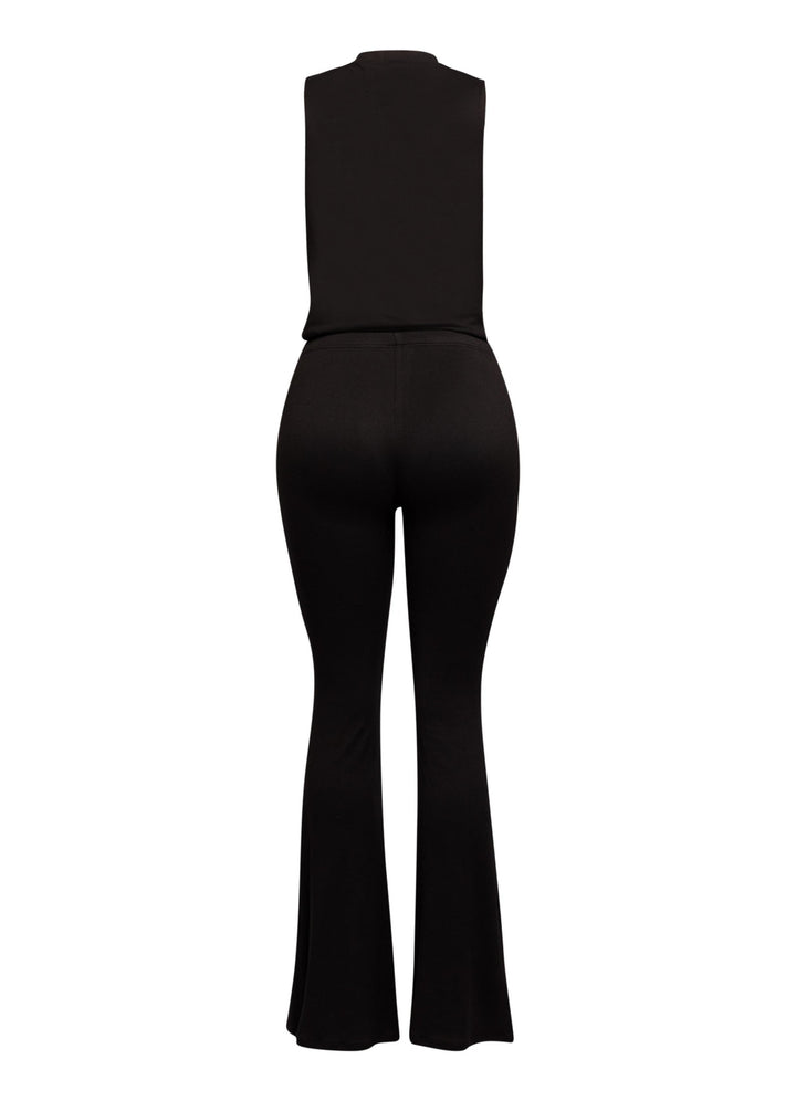 Minimal black matching set with plunging neckline and soft flared trousers