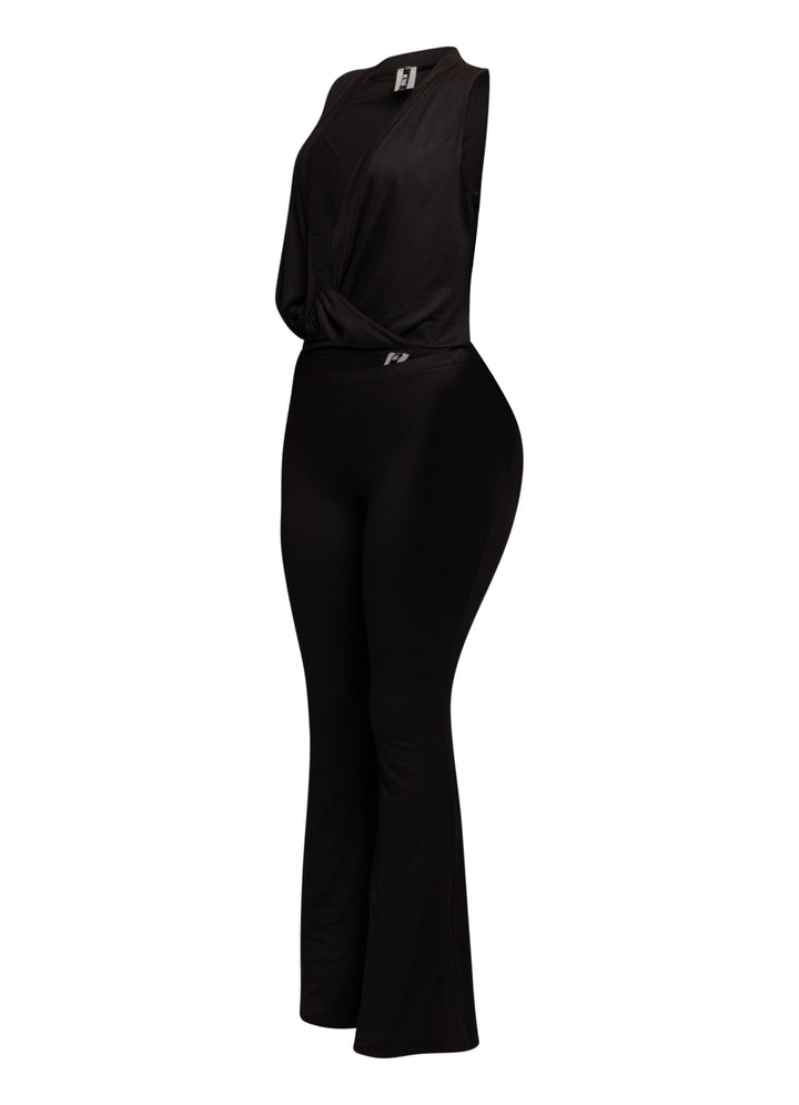Black V neck two-piece outfit with elastic waistband pants and twisted crop hem