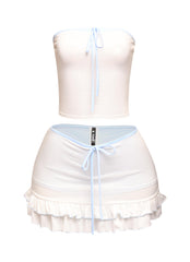 White pastel trim mini set with light blue piping, tie-front bandeau, and ruffled hem skirt