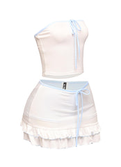 White tube top and skirt outfit with soft blue ties, retro Y2K flair, and lightweight polyester spandex blend