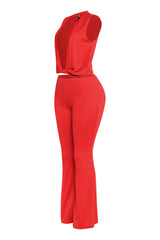Curve-accentuating red V neck twist set with slim flare bottom and sleeveless cut