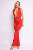 Bold red deep V neckline two-piece set with twisted crop top and flared pants

