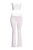 Bright white lounge outfit featuring twisted front top and sleek bottom

