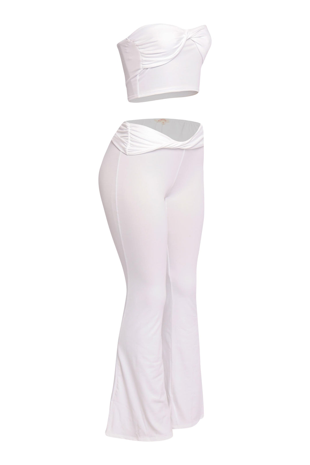 White matching set with crossover waist detail and figure-hugging silhouette

