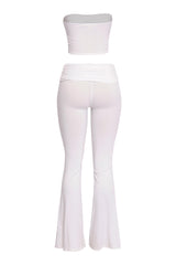 Clean white bandeau and flare pant outfit with elevated basics vibe

