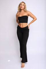 Classic black tube top and low rise flare pant set with stretch fabric

