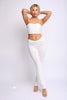 Crisp white twist tube top and matching flared pants with low rise fit

