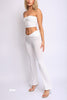White two-piece set with strapless bandeau and soft stretch flare pants

