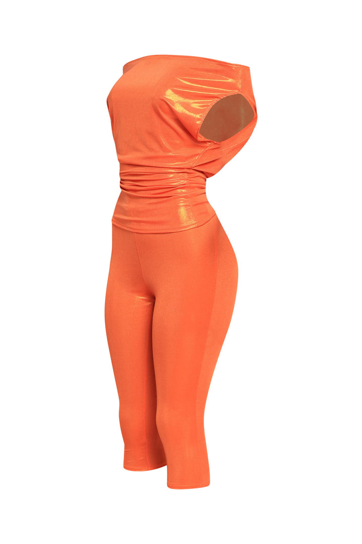 Bright orange shimmer capri set with relaxed fit top and sculpted stretch bottoms