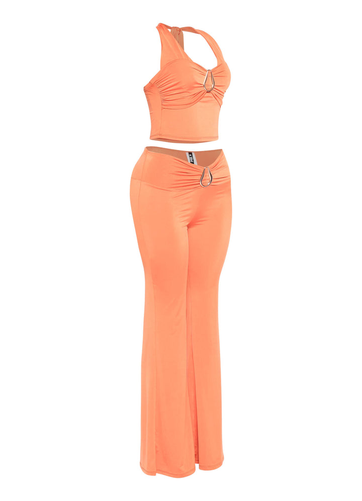 Sleeveless orange halter top and pants for summer styling