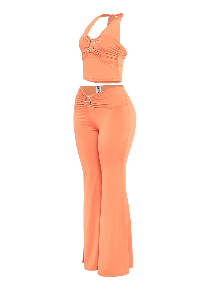 Vibrant orange two piece halter crop set with flared bottoms
