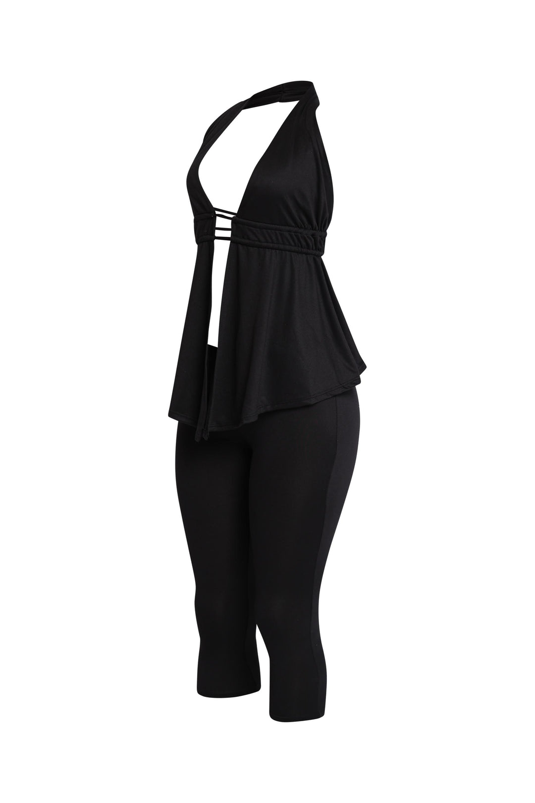 Sleek black two-piece with cropped leggings and backless halter top

