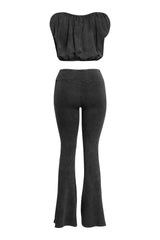 Back view of washed black co-ord with slim-fit flares and scoop back bubble top