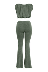 Back view of olive green cotton two-piece with curved seam flares and crop top