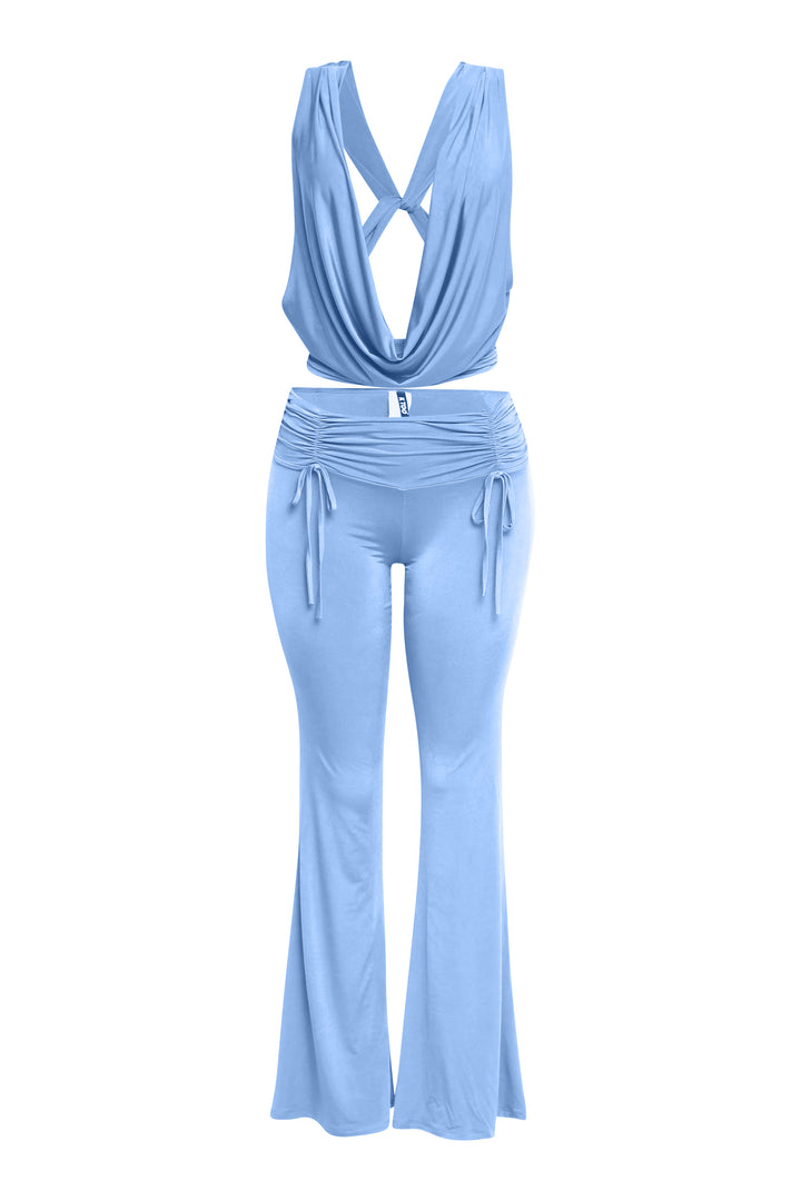 Soft blue two-piece set with open back cowl neck top and flare pants
