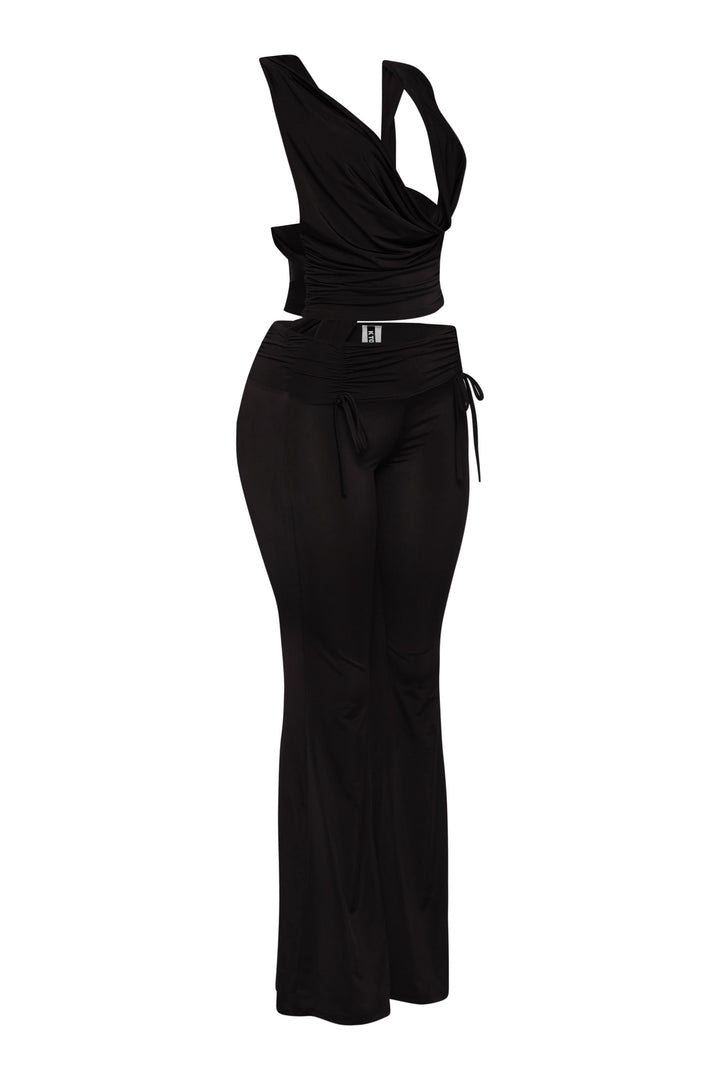 All black matching two-piece with draped neckline and flared silhouette