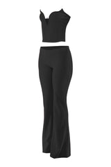 Black matching set right quarter view with curve-hugging fit and elongating flare hem