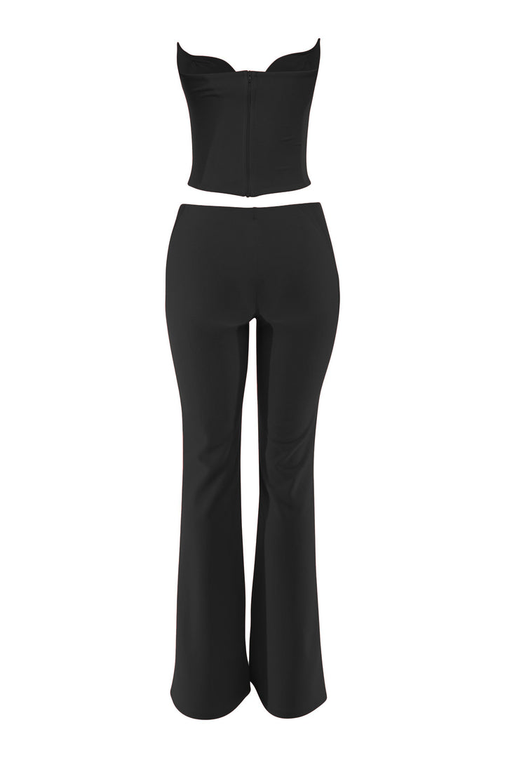 Black corset set back view with zip closure and smooth pant silhouette