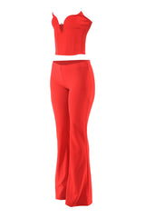 Red outfit with a top and flared pants on a white background
