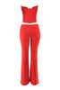 Red corset and flare pant set back view with exposed zipper and sleek tailored finish