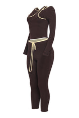 Left side angle of mocha bodycon matching set with cold shoulder detail