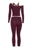 Back view of burgundy slim-fit crop set with crisscross back strap detail