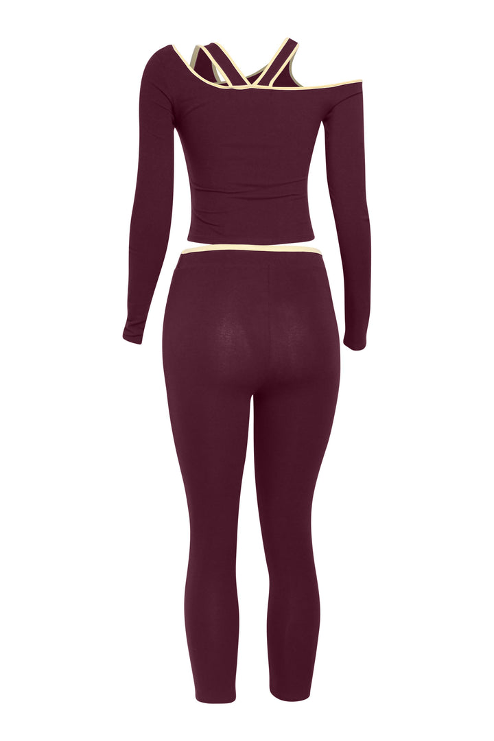 Back view of burgundy slim-fit crop set with crisscross back strap detail