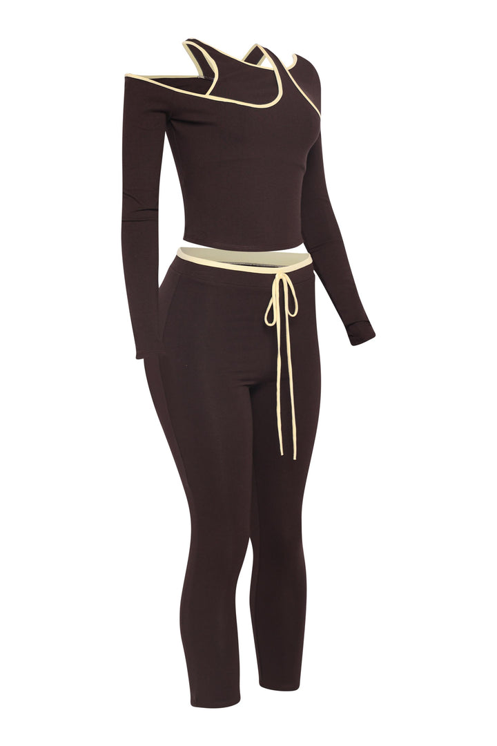 Right angle showing mocha stretch lounge set with edgy piping and sculpted fit