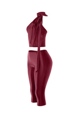 Right angle showing burgundy satin matching set with sheen and flattering slim cut