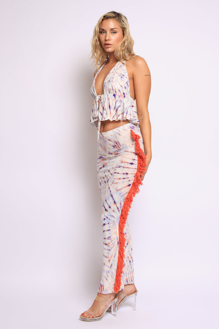 Vibrant tie-dye halter top with flared ruffle hem and side-trimmed matching skirt

