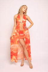 • Orange tie dye halter maxi top and mini skirt set front view with open front detail
