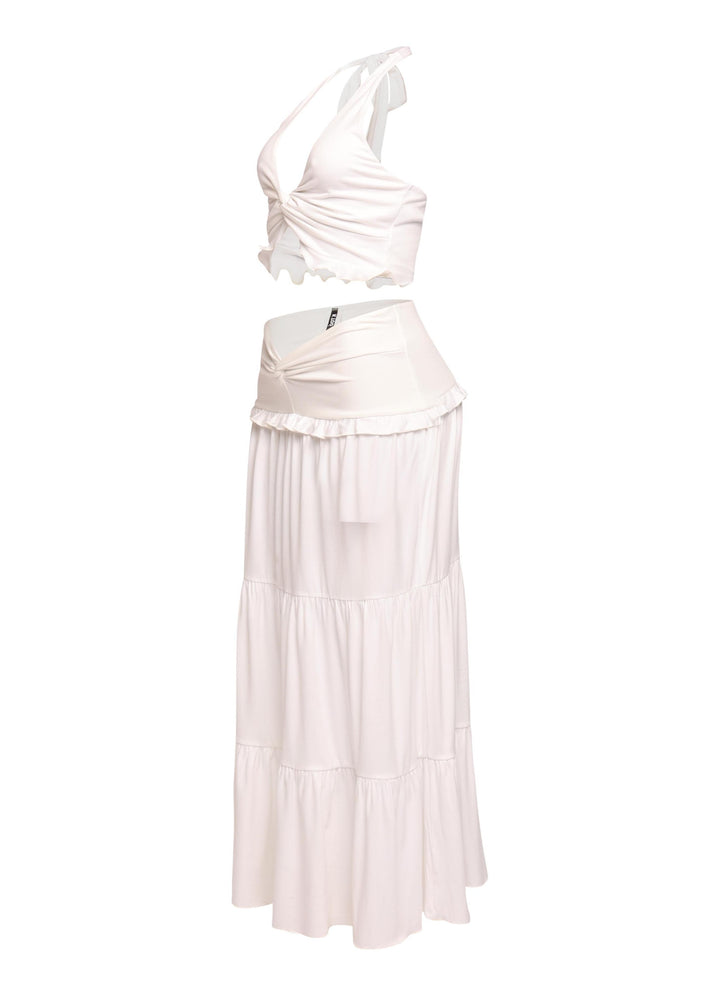 White ruffle hem maxi skirt set with open back and soft summer silhouette

