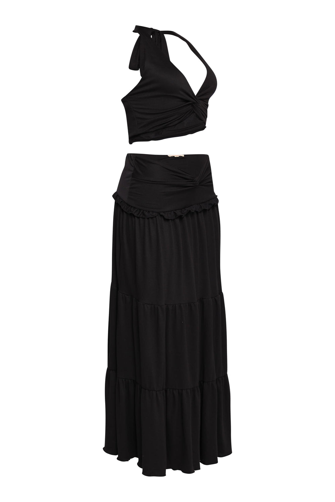 Black twist halter crop and V-waist maxi skirt combo with soft volume

