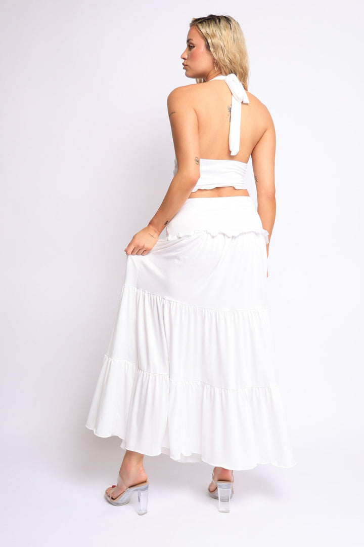 Summer white two-piece set with plunging neckline and flowy maxi skirt

