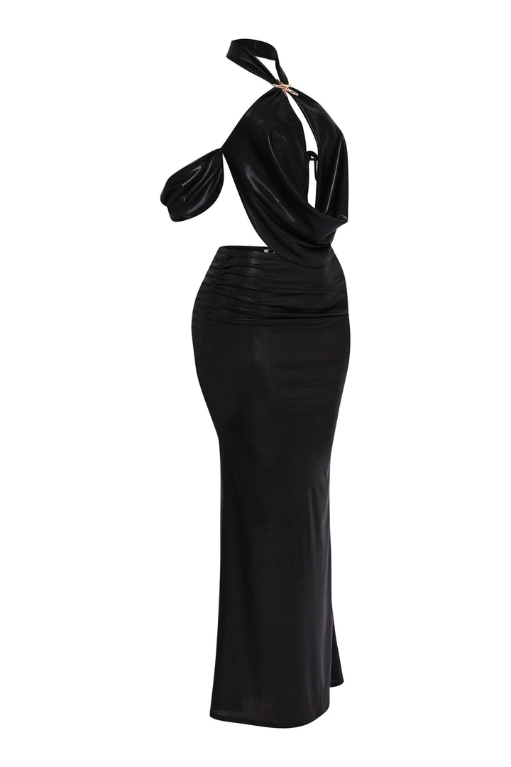 Black cowl neck top with relaxed sleeve and open back paired with ruched evening skirt


