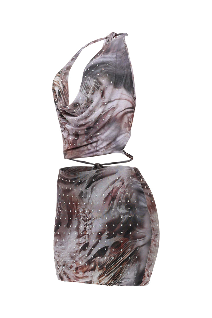 Two-piece outfit with marbled pattern on a white background