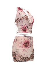 Side view of pink floral mesh crop set with cowl neckline and printed mini skirt