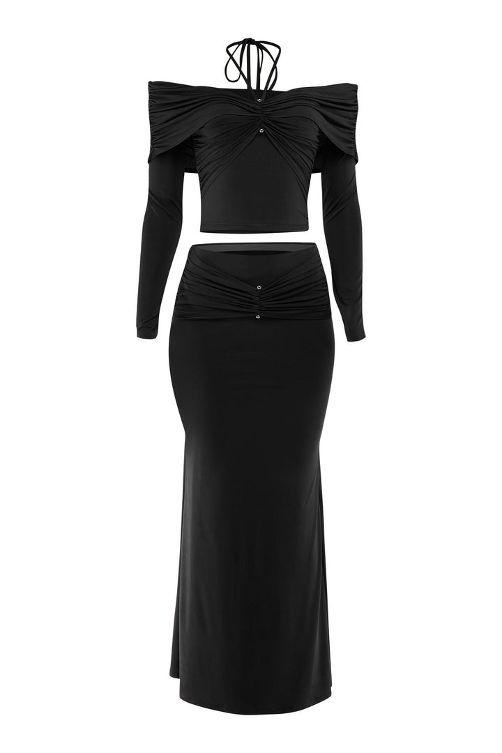 Black off-shoulder top and pencil skirt set on a white background