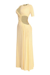 Bold yellow cutout maxi dress with sexy leg reveal and figure-loving stretch

