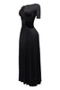 Minimalist black maxi with twist detailing, soft drape, and elevated night-out styling

