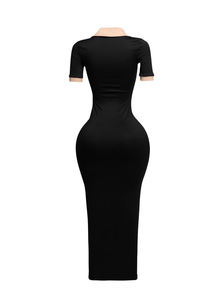 Side view of black fitted dress with nude collar and sleeve tips, sleek and structured

