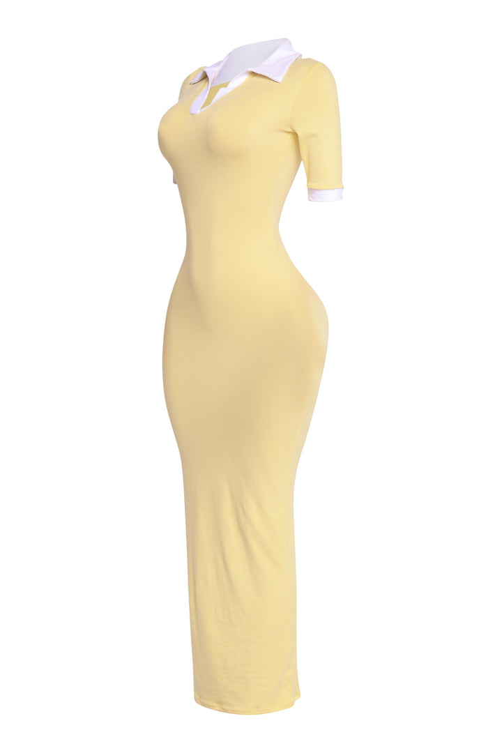 Lemon yellow stretch maxi dress with white trim on collar and sleeves, polished and curve-enhancing fit

