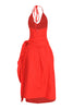 Red vacation-ready midi with wrap skirt, halter straps, and bold feminine energy