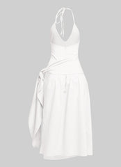 Soft white wrap midi with halter straps, adjustable tie, and clean minimalist vibe