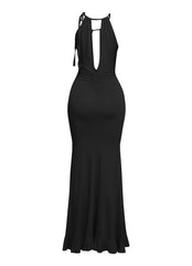 Sleek black plunge dress with shoulder tie and ruched center

