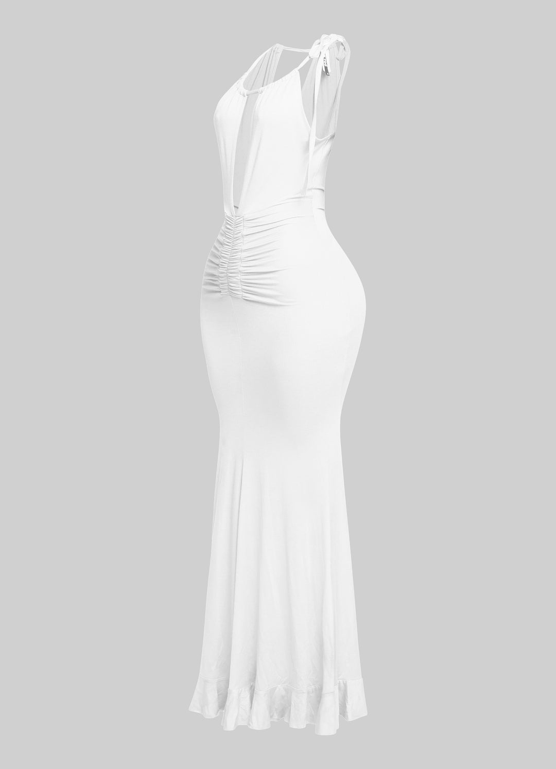White beachy halter dress with deep neckline and flirty movement

