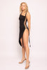 Edgy black midi dress with asymmetrical hemline, one shoulder neckline, and grommet lace-up detail