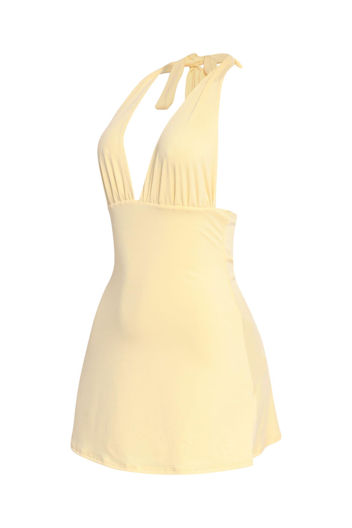 Sorbet yellow mini dress with plunge neckline and back-tie halter


